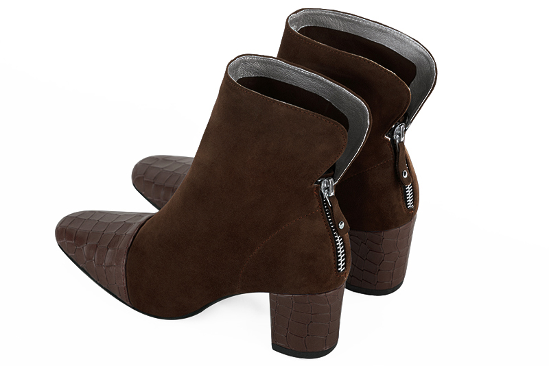 Dark brown women's ankle boots with a zip at the back. Square toe. Medium block heels. Rear view - Florence KOOIJMAN